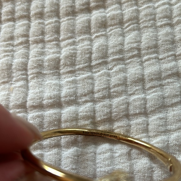 Gold Kate Spade bracelet with rhinestone knot design - Picture 3 of 5
